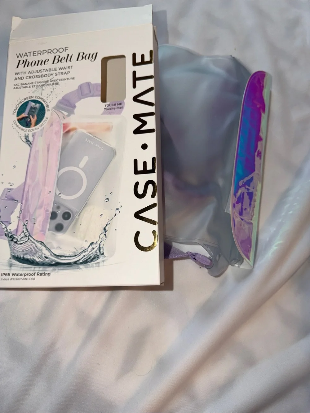 A BEAUTY-NEW case-mate Iridescent Waterproof Phone Belt Bag/Crossbody Strap.